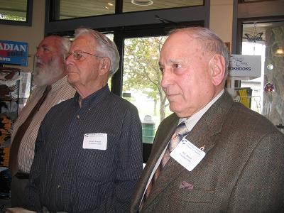 Herb Brown looks on with 1960 Past President Bruce Goulet