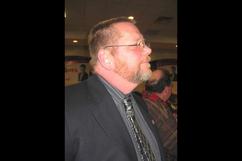 <b>NDP candidate Dave Fluri arrives at the Davedi Club to congratulate Anthony Rota. Photo by Kate Adams, BayToday.ca.</b>