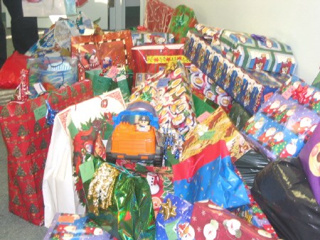 Teletech employees delivered these presents to the North Bay Children's Aid Society. Photo by Phil Novak.