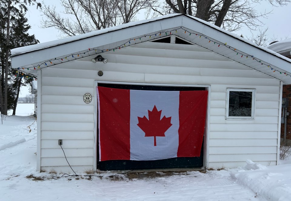 canadian-flag-on-garage-winter