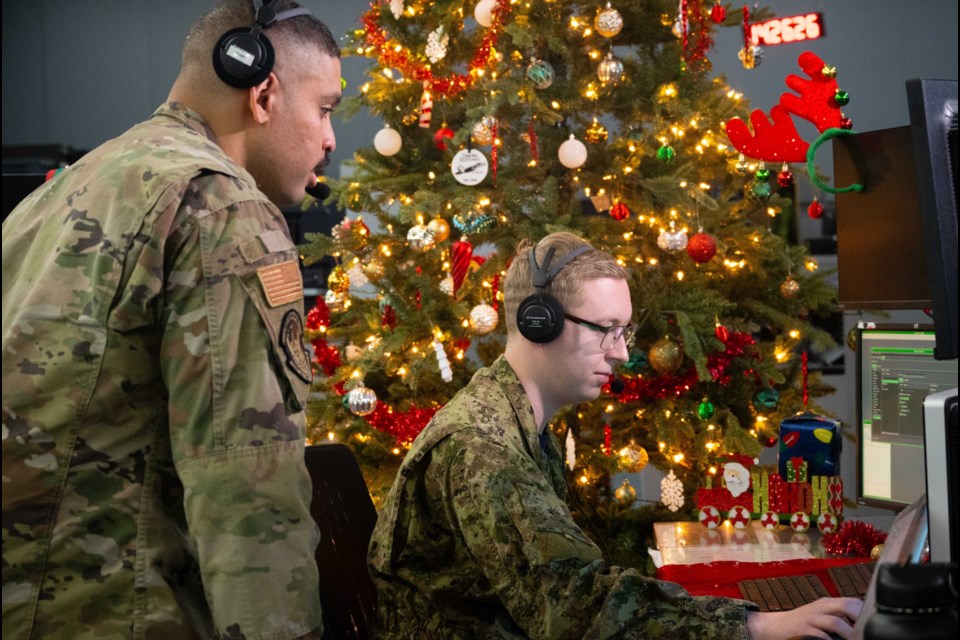 Techs training in preparation for NORAD tracking Santa mission ...