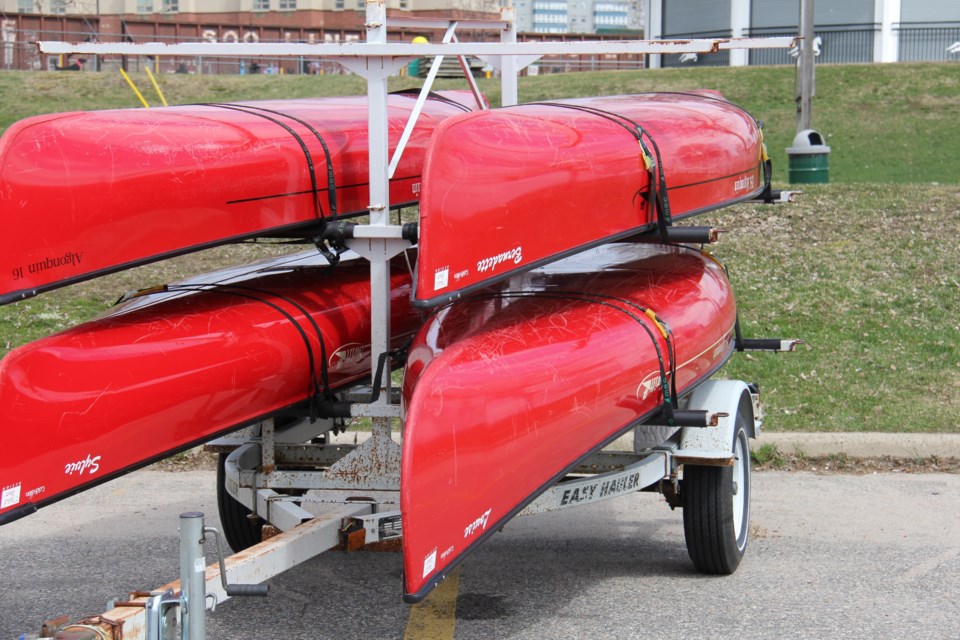 USED 170511 10 Red canoes. Photo by Brenda Turl for BayToday.