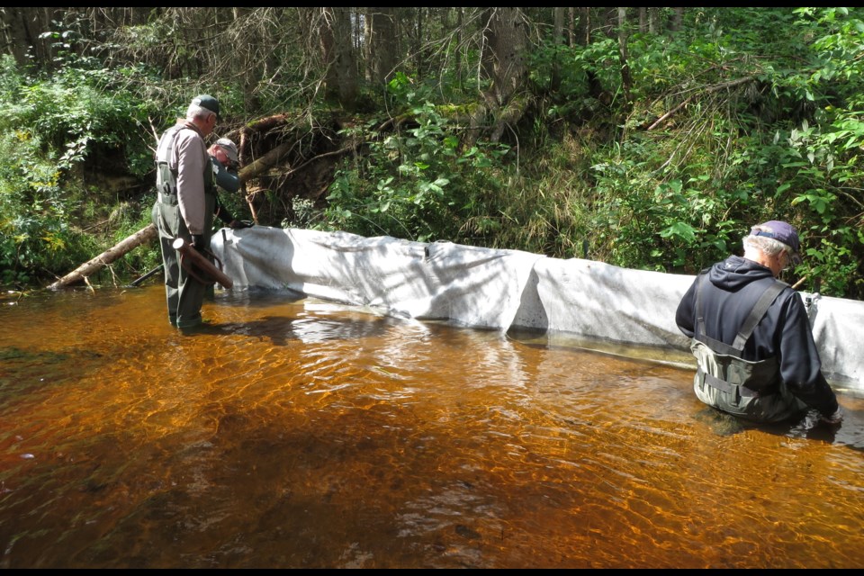 Work is continuing on Depot Creek to improve water flow.                      