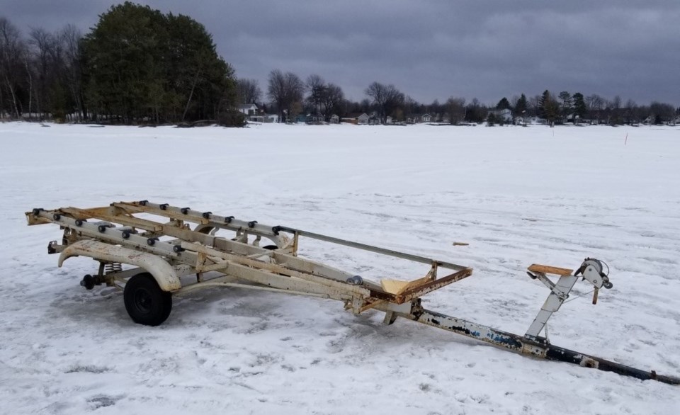 abandoned boat trailer