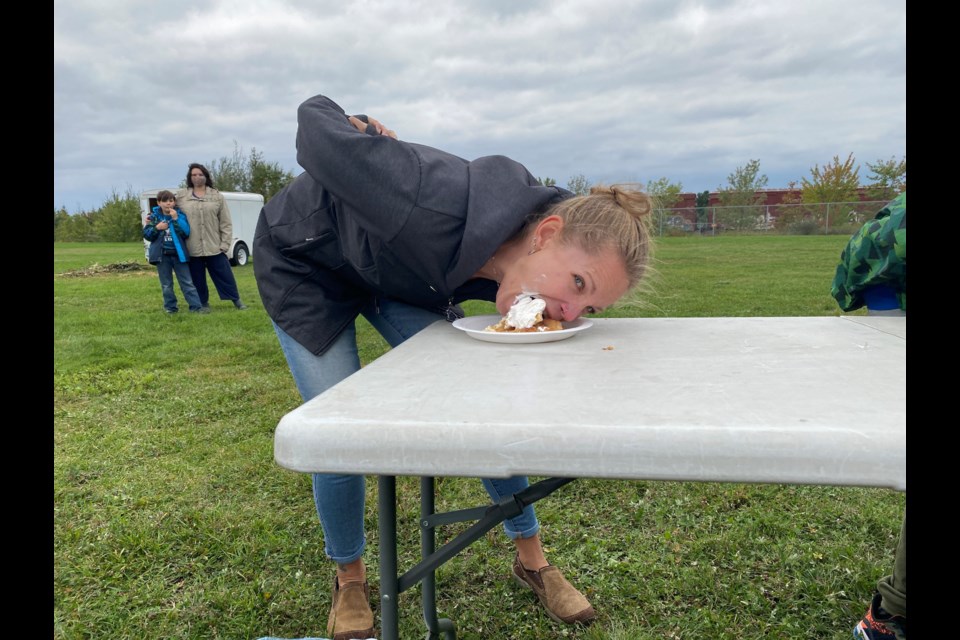 Leigh Cornick won the pie eating contest at the Farmers' Market