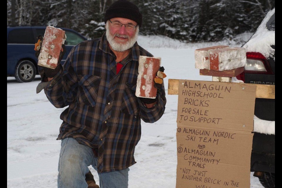 Stephen Todoroff, a retired Almaguin Highlands Secondary School teacher, is selling bricks from the abandoned high school to support two programs.