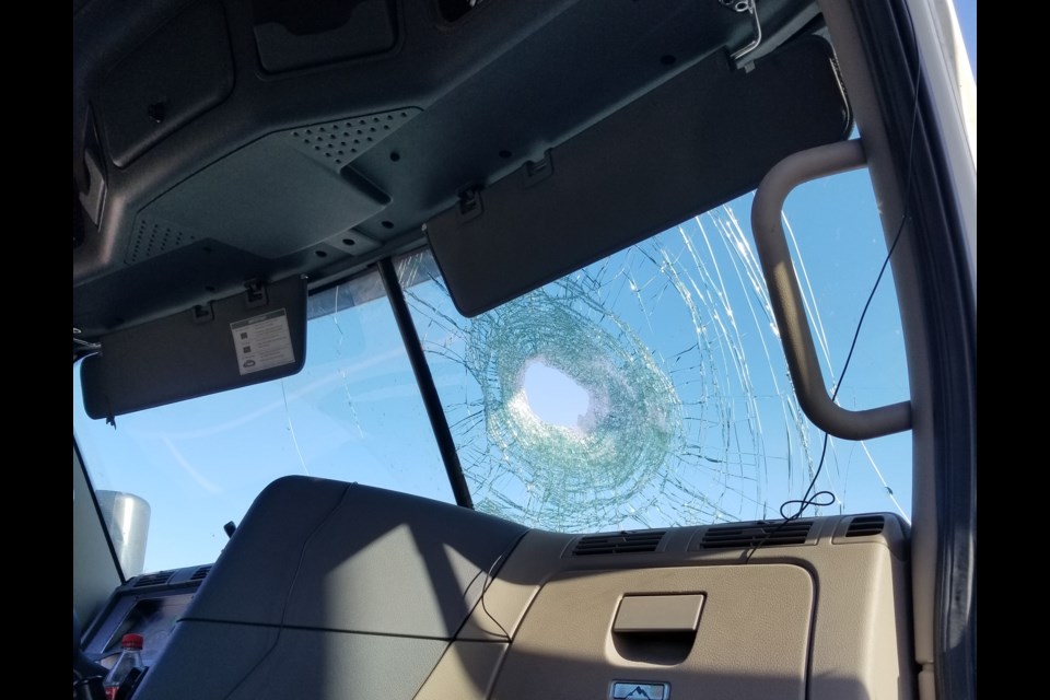 A huge rock went through the window of this transport on Saturday. Photo submitted.  