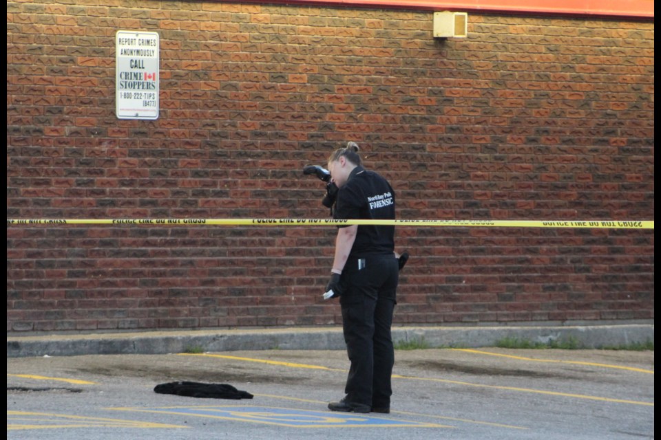 Police are investigating an early morning stabbing on First Ave. Photo courtesy Dave Gault.