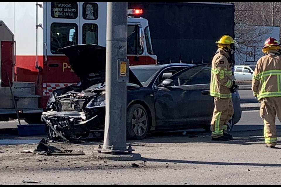 This stolen black Audi sedan ran a red light according to witnesses and struck a red SUV. Both occupants of the vehicle tried to flee the scene. Jeff Turl/BayToday.