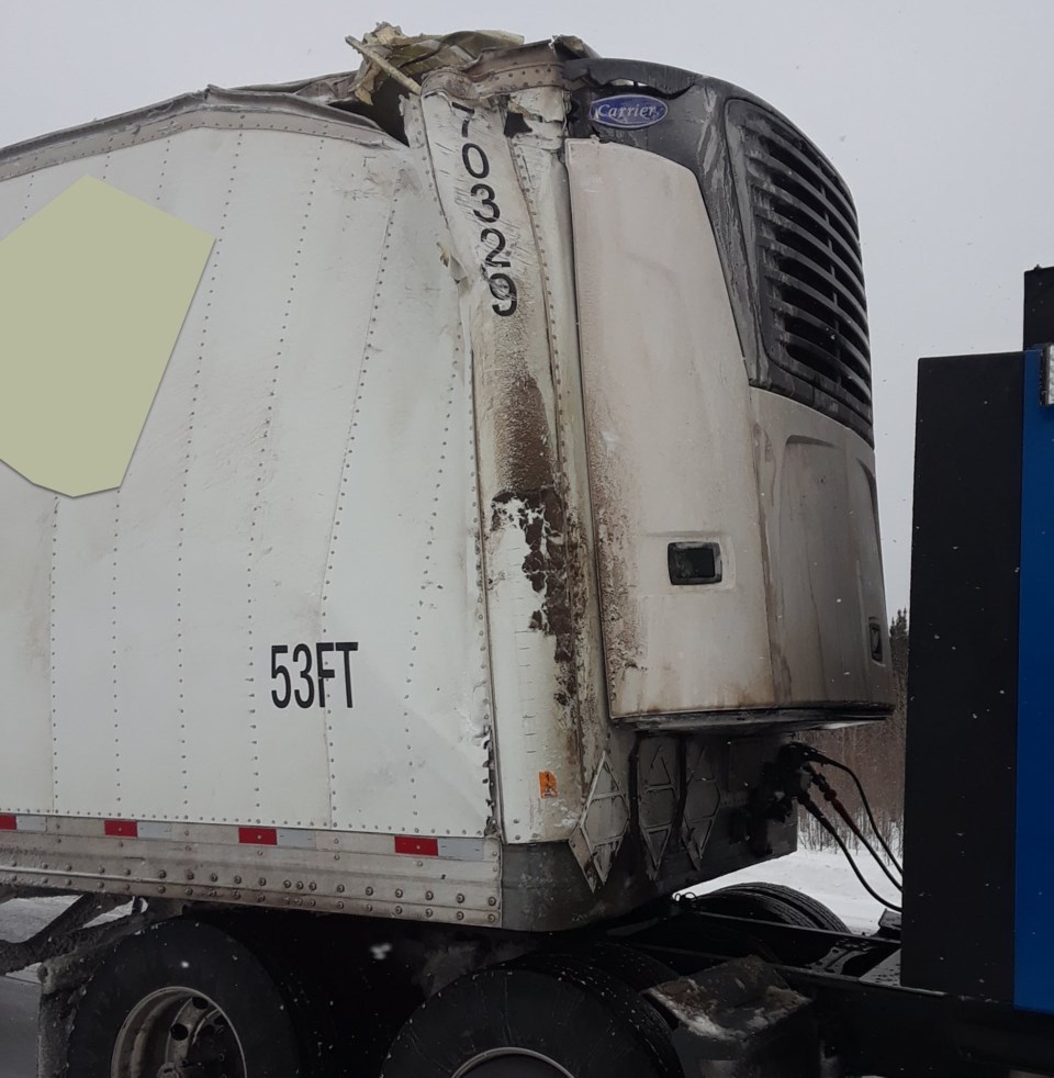 Towing a heavily damaged trailer along Highway 11 results in unsafe