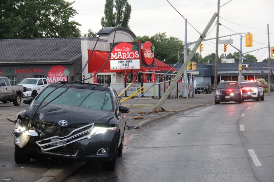 At least one person was taken to hospital after this car took out a hydro pole on Lakeshore Drive.