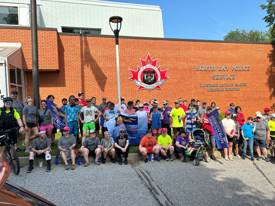 Police beat the heat for Special Olympics Torch Run North Bay News