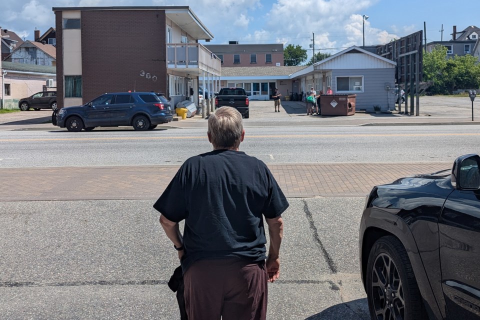 Partners Bowling and Billiards owner Bonnie Zufelt keeps a close eye on the activities across the street.