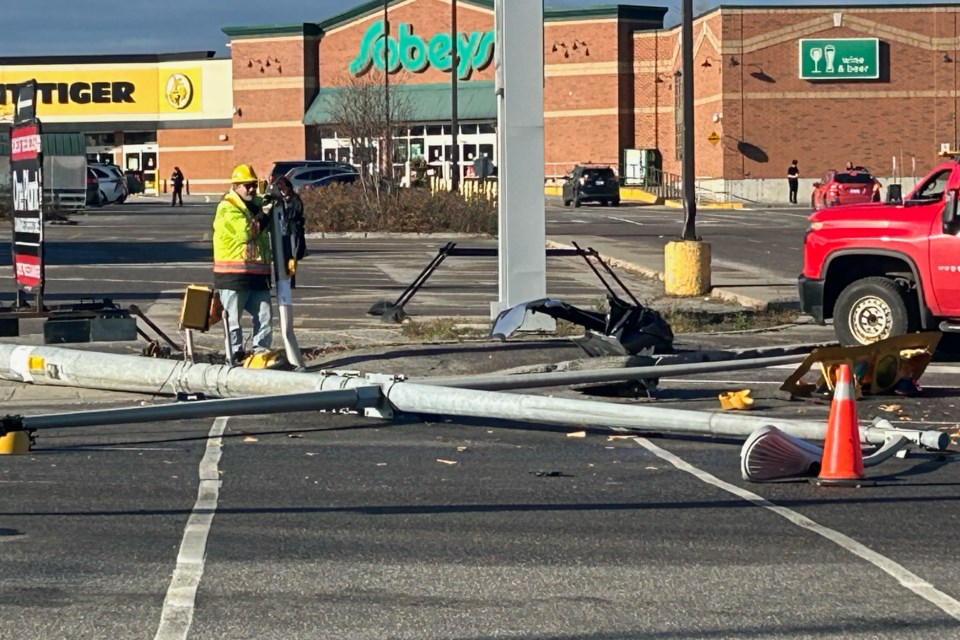 A downed light pole on Algonquin Avenue.