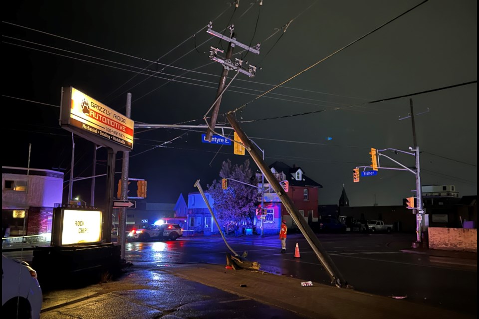 A large truck took a turn to tightly Tuesday night, snapping a hydro pole and putting much of the downtown in darkness.