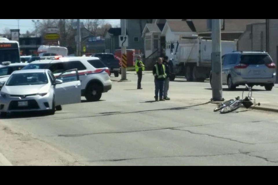 This bicycle-car collision happened shortly before 2 p.m. Photo by Stu Campaigne.