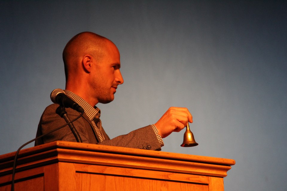 Teacher Mike Brisson rings a bell to tell one of the candidates that their time is up at an all candidates event at Chippewa this afternoon. Photos by Jeff Turl.