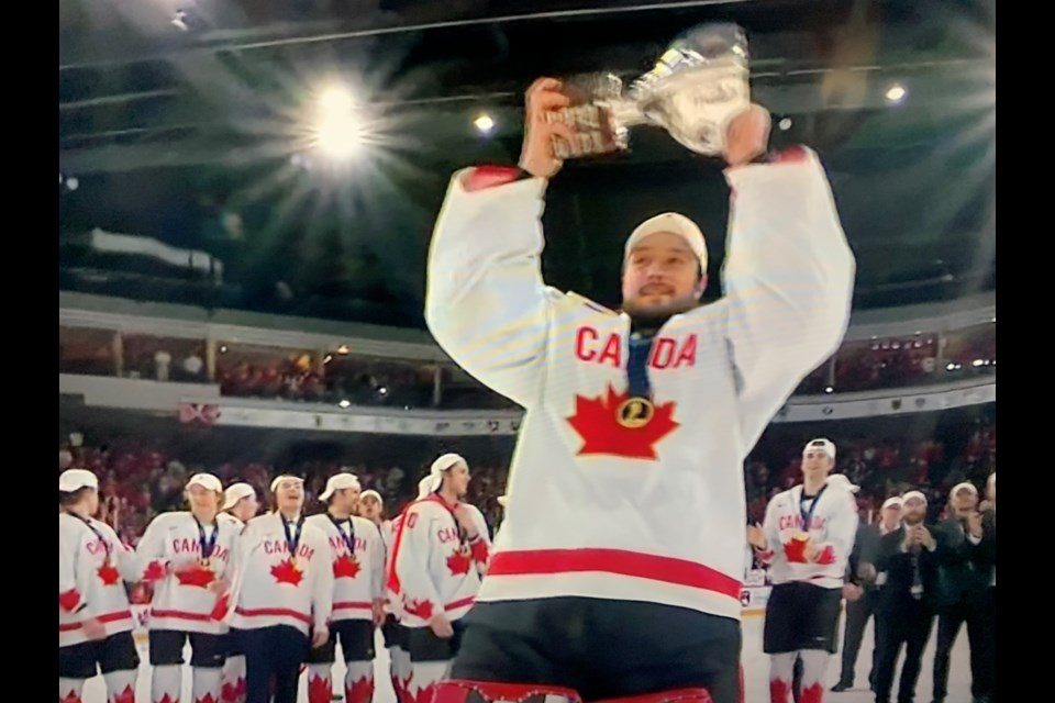 Gaudreau hoists the World Junior championship trophy. Photo courtesy TSN. 