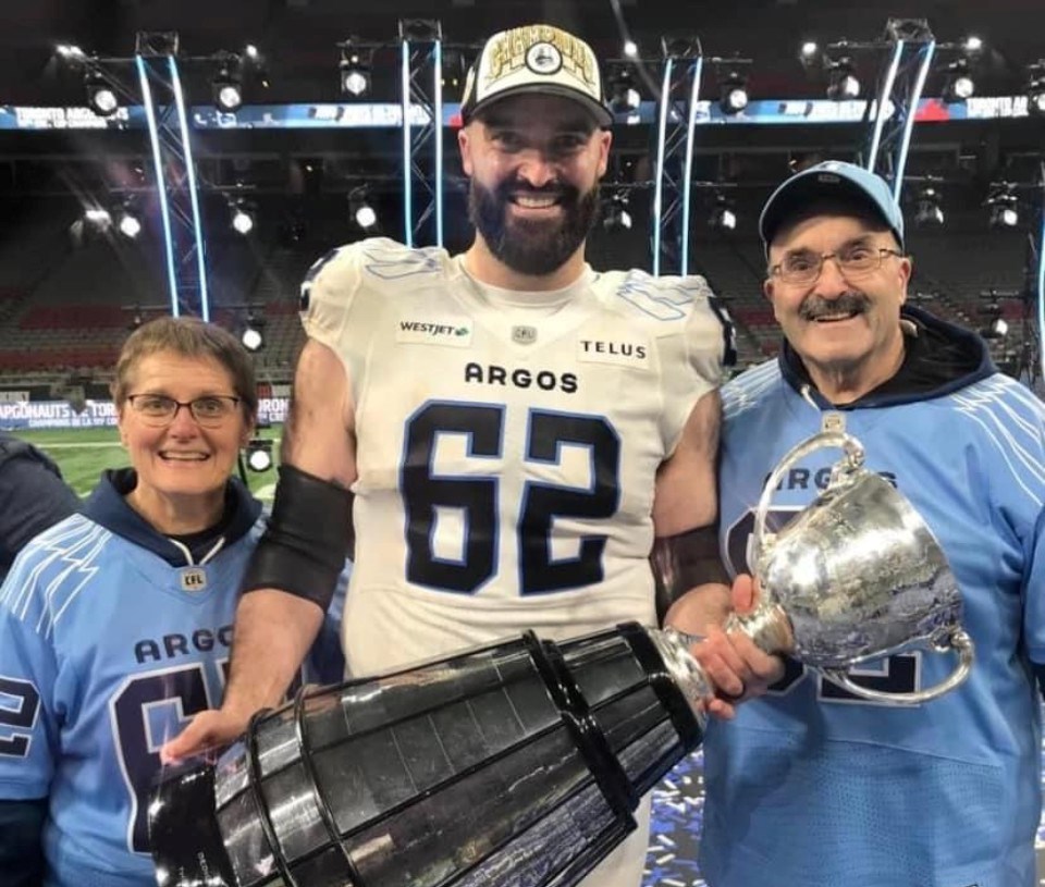 2024-11-18-ryan-hunter-grey-cup-with-mom-and-dad