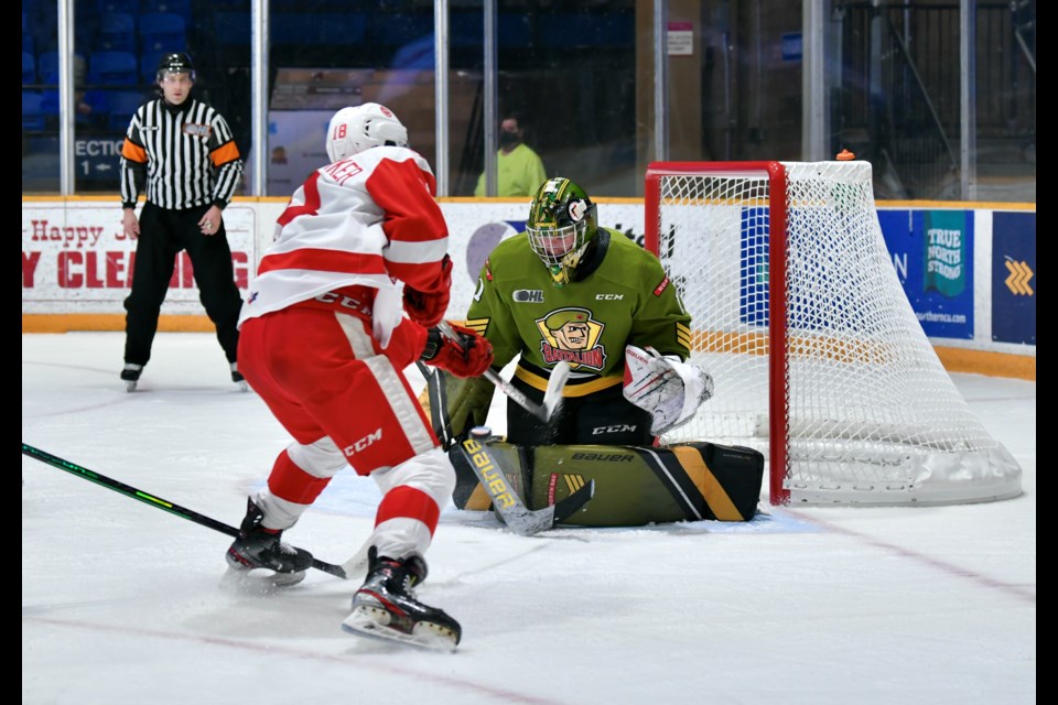 Joe Vrbetic with one of his nine first period stops.  