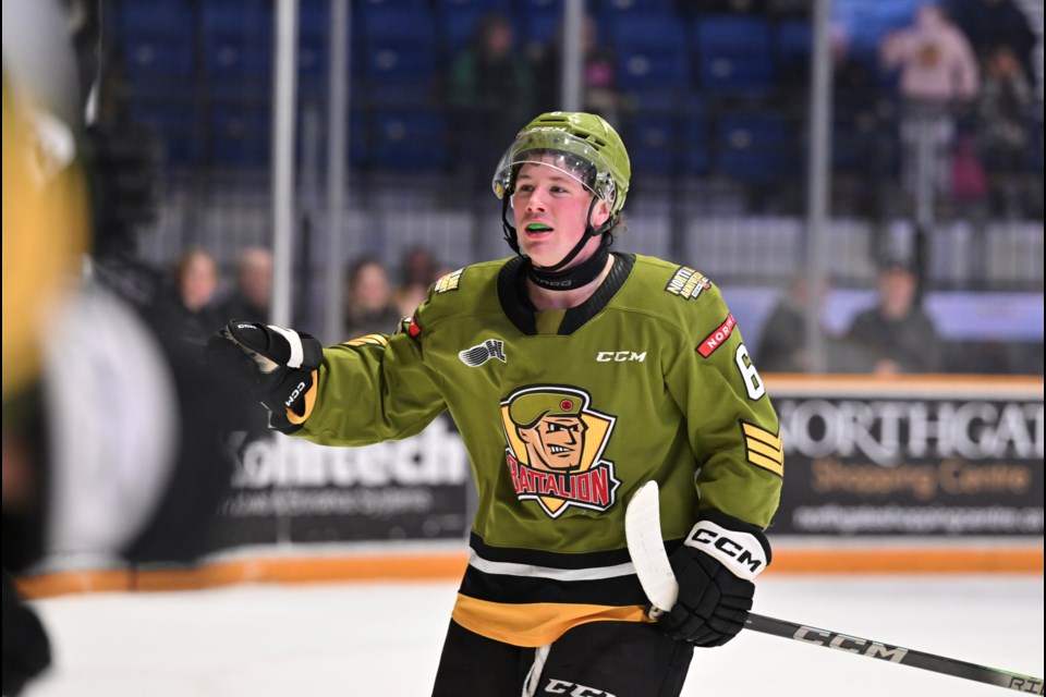 Jacob Therrien celebrates his second period goal against the Bulldogs.  