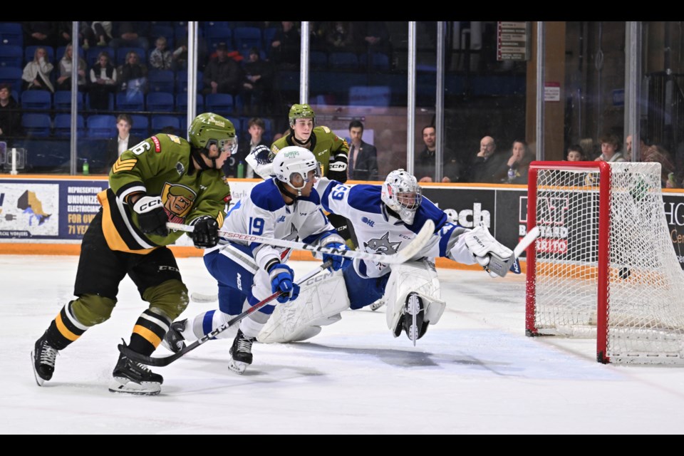 Owen Van Steensel gets the Troops on the board.  Photo by Tom Martineau/BayToday. 