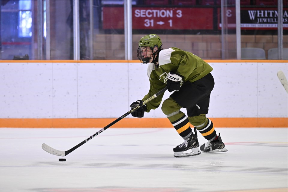 Ryder Carey moves down the ice during a Green vs White scrimmage at Memorial Gardens during North Bay Battalion main camp. 