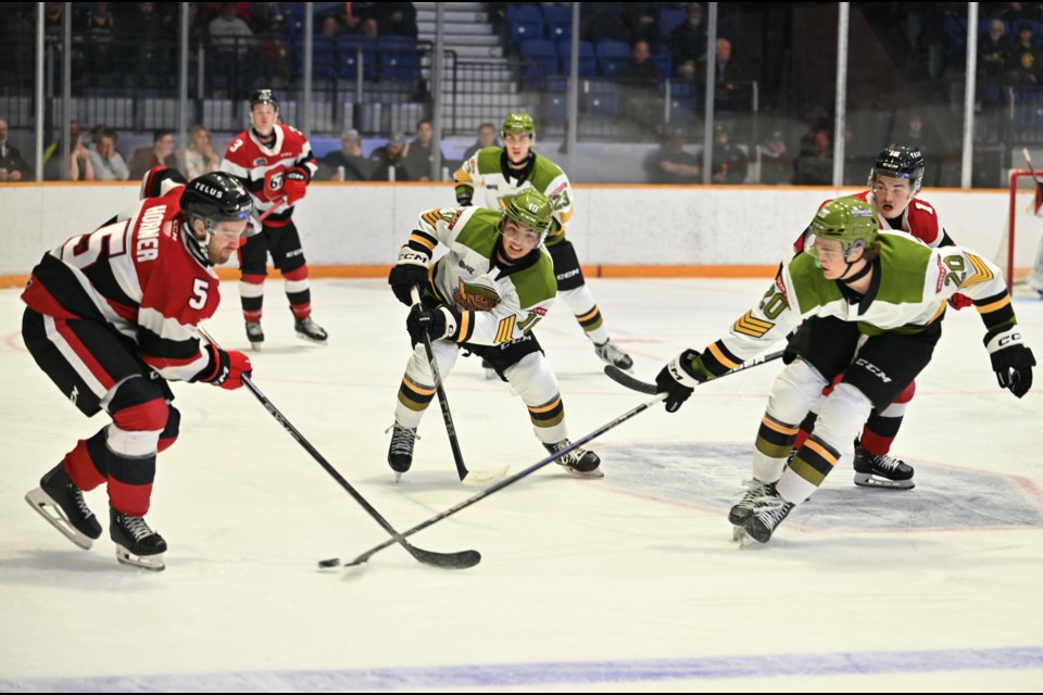 Battalion try to move the puck through the neutral zone. 