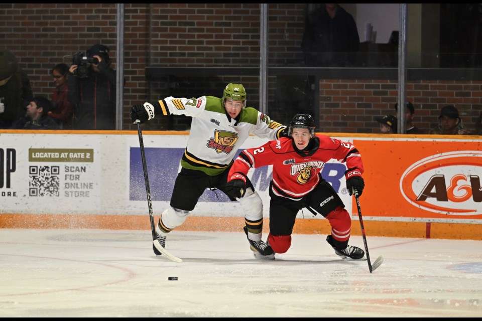 Andrew LeBlanc battles with Attack's Braedyn Rogers. 