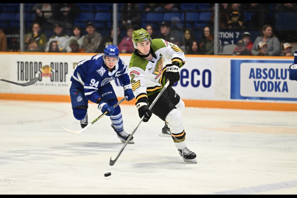 Wyatt Kennedy with the puck during first period action. 