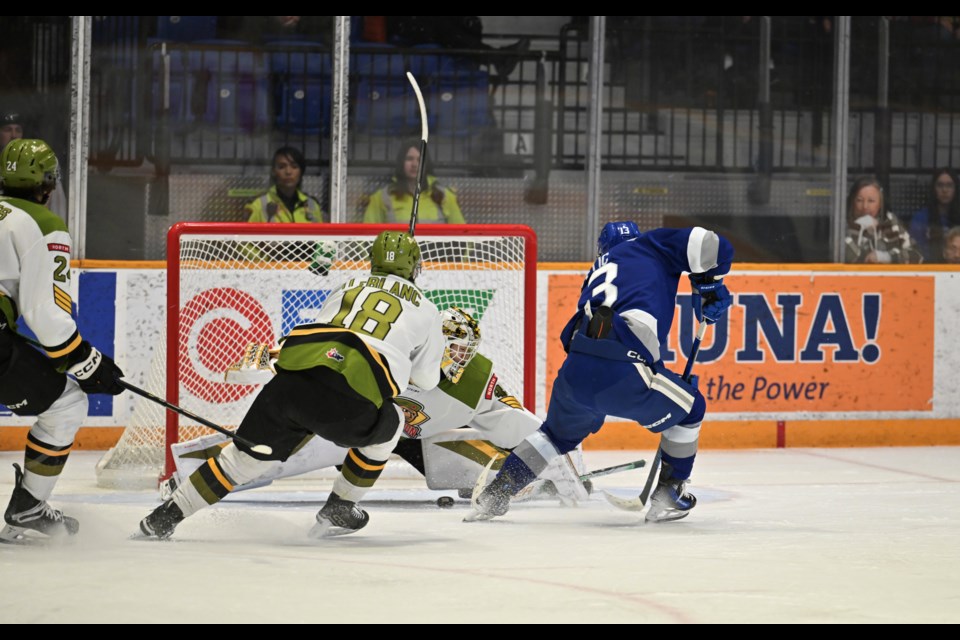 Wolves Kocha Delic stopped on a breakaway by Mike McIvor.