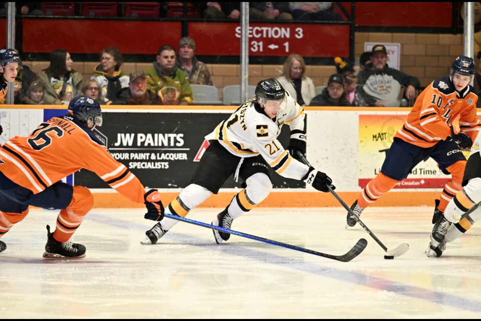 Ethan Procyszyn brings the puck across the Firebirds blueline. 