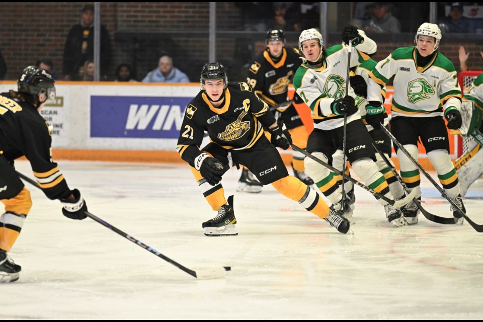 Kent Greer tries to get a shot through traffic early in the first period. 