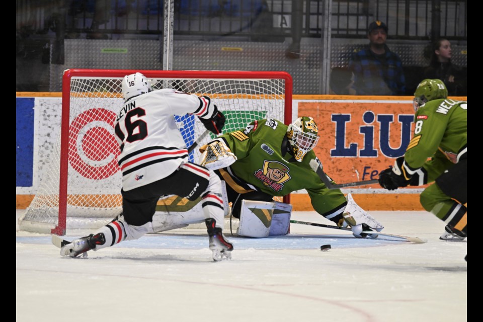 Icedogs and former Powassan Voodoos forward Mike Levin with a great chance on Mike McIvor. 