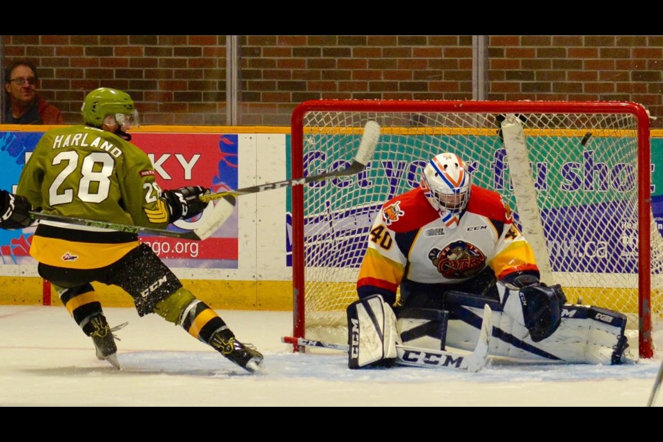 Steve Harland scores the OT winner over the Erie Otters. Photo by Tom Martineau