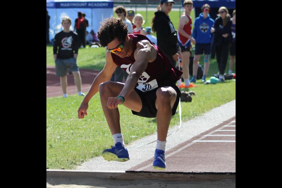 Dayne Meyer competing in the Triple Jump for Algonquin. Photo by Drayden Meyer.  