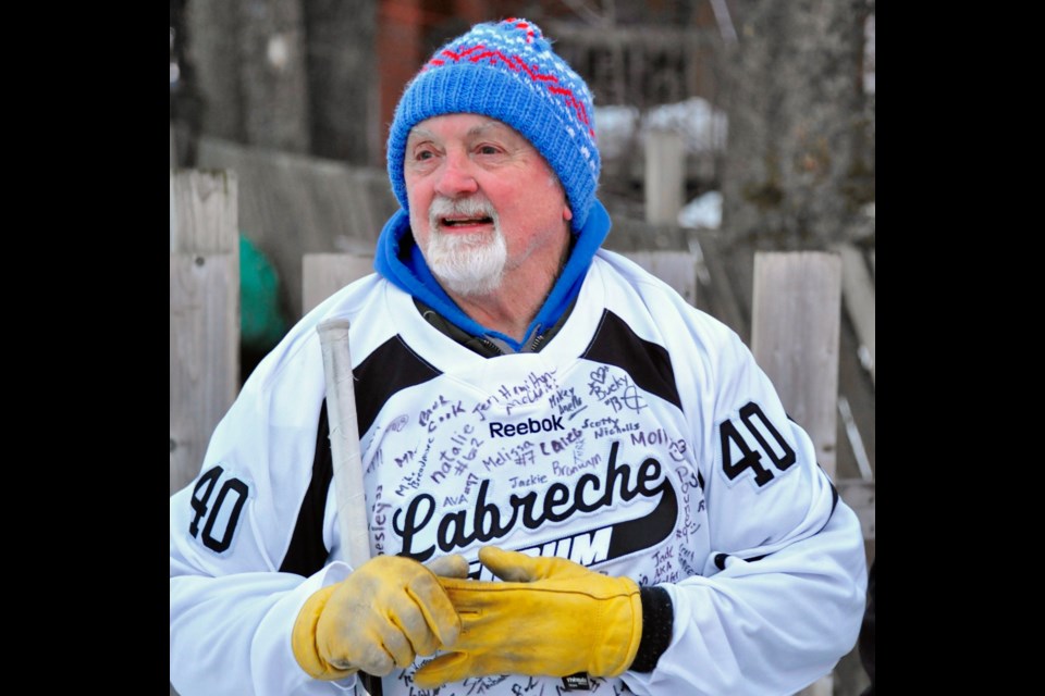 Butch in his new Labreche Forum jersey with #40 on the back, celebrating his dedication to maintaining the rink for the past 40 years.  Photo by Tom Martineau.  