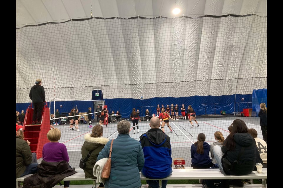 Spectators watch the finals of the 2014 Christmas Classic, inside the Canadore Dome.