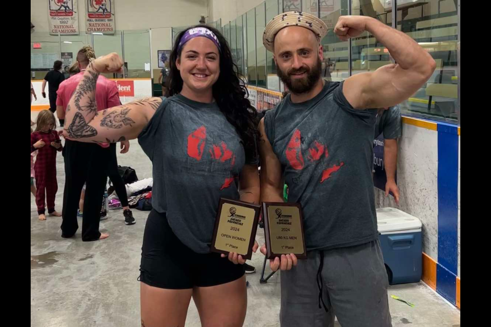 Alysha Loeffen (Left0 and Brad Janzen celebrate a podium finish at the provincial Strongman competition in Sudbury. 