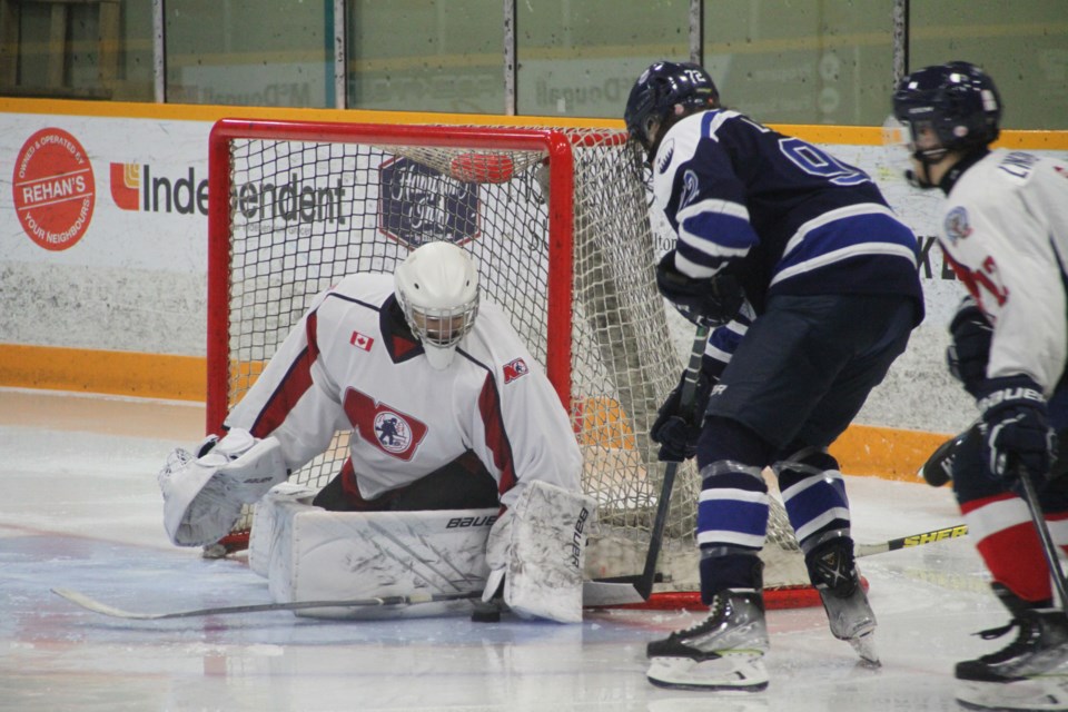 Goalie Mike McIvor makes one of his 39 stops. Photo by Chris Dawson/BayToday. 