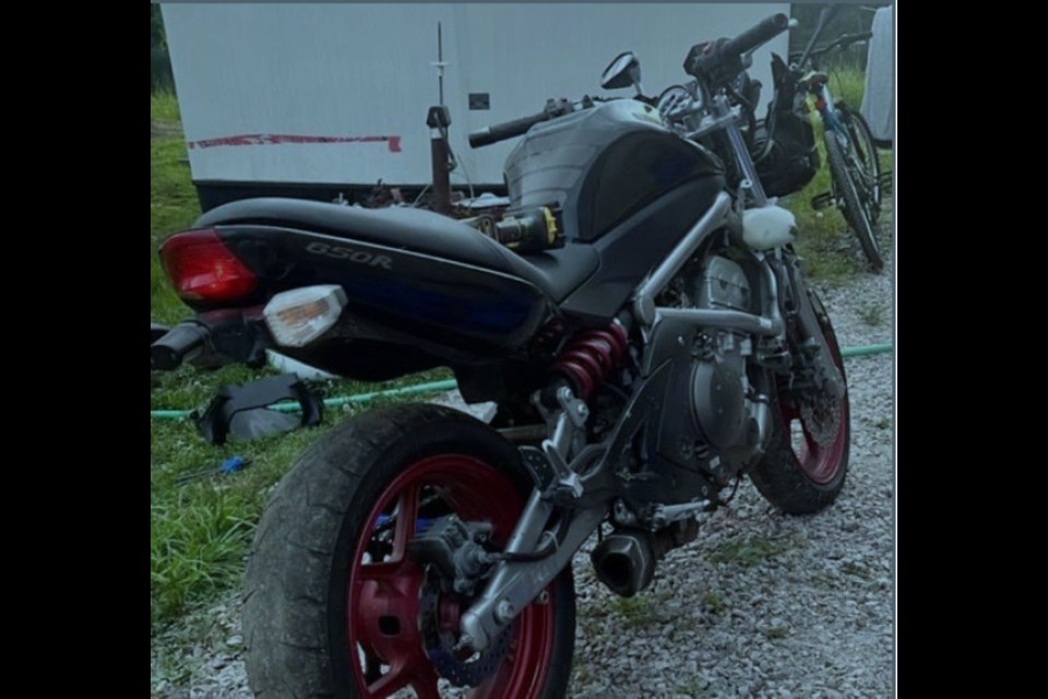 A black 2008 Ninja Kawasaki 650CC