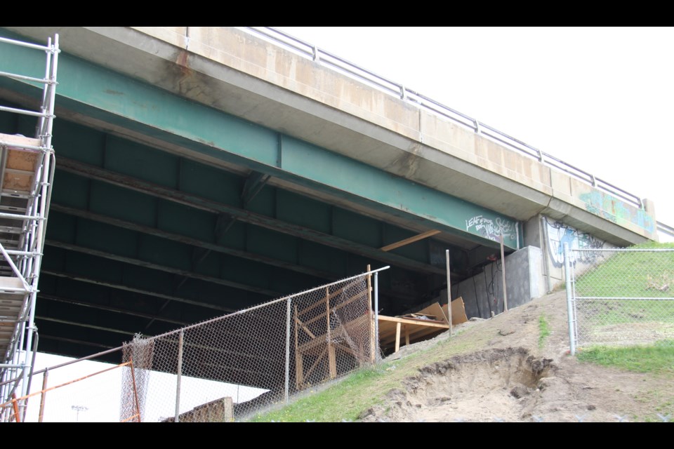 The jacks will be placed under the bridge where the wires are presently hanging. Photo by Jeff Turl.