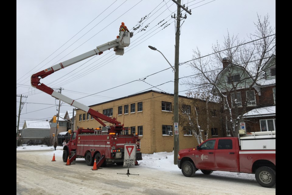 Hydro crews work to repair switches on Worthington St. Photo by Chris Dawson.