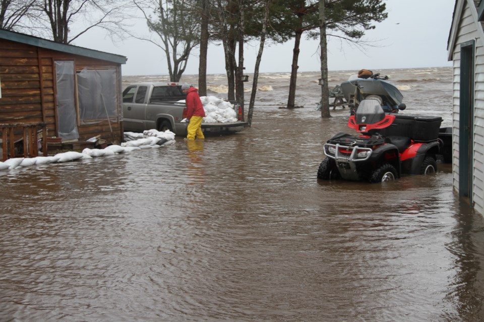 The Allard cottage surrounded by flood waters.  Photo by Chris Dawson/Baytoday.ca 