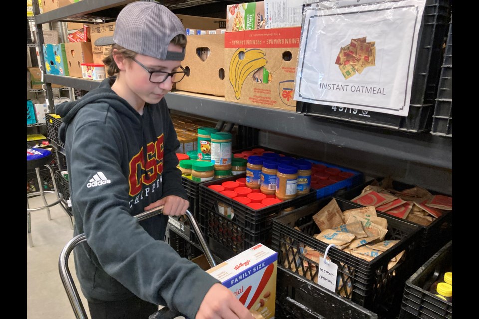 Aidan Baxter enjoys time spent volunteering at the North Bay Food Bank. 