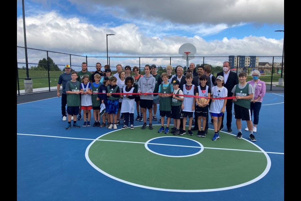 Ribbon cutting ceremony to mark the official opening of the $305,000 multi-use recreational courts 