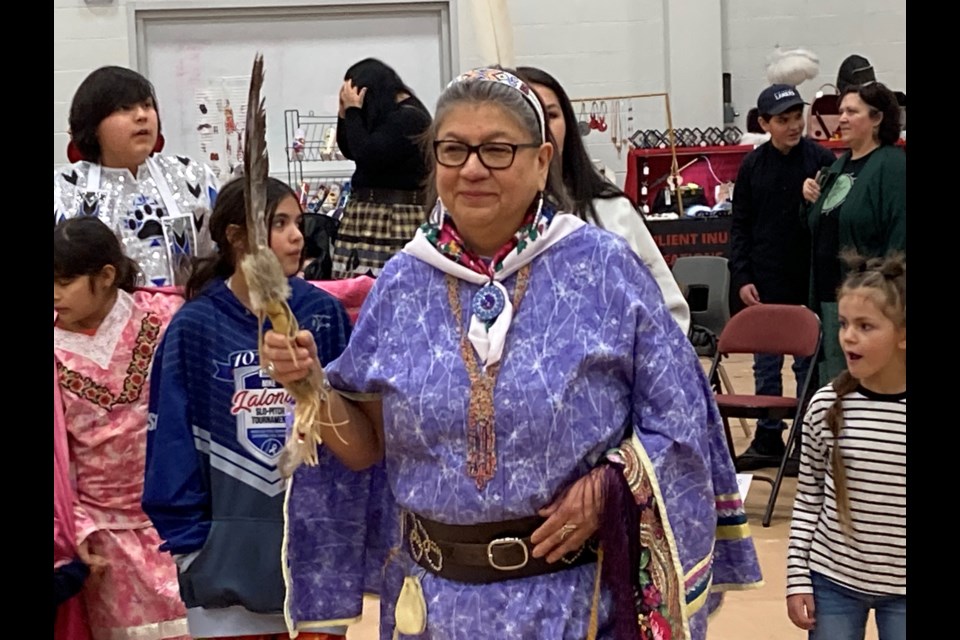 First Time dancer Lina McKenzie leads family and friends around the gymnasium at Canadore College 