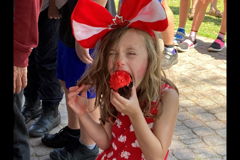 Five-year-old Ava making the most of her Canada Day cupcake at the North Bay waterfront. 