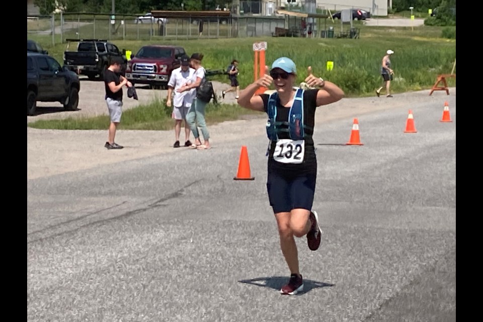 Crossing the finish line at the Kiwanis Nipissing Triathlon 