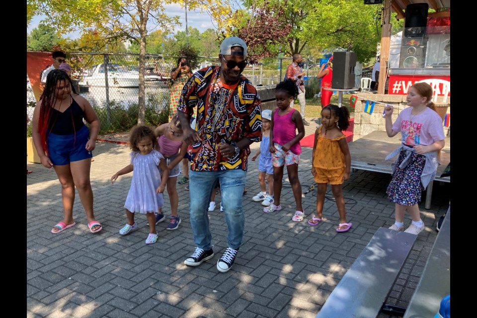 Dancing to the beat of Afro-Caribbean  music at a cultural festival 